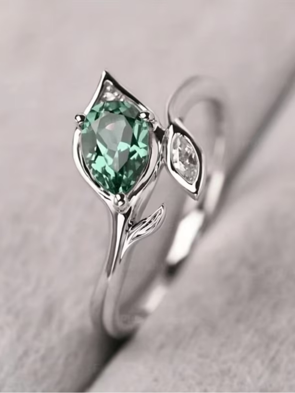 Silver Ring with Green Teardrop Stone and Clear Accent